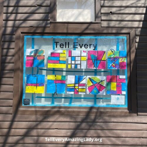 First-graders at P.S. 154 ring in spring in the T.E.A.L.® Community Center windows